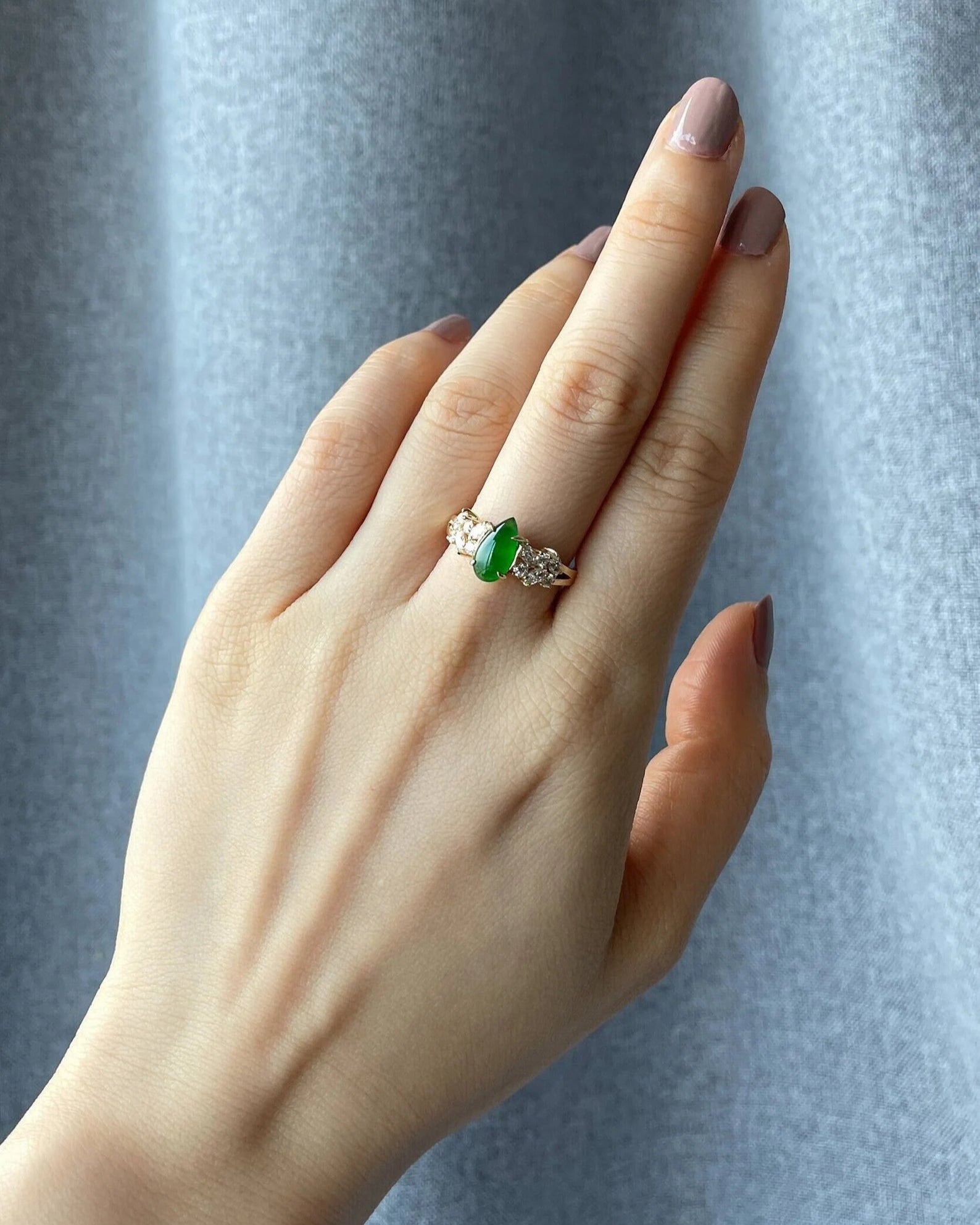 fine jewelry ring with pear green jade and marquise diamonds
