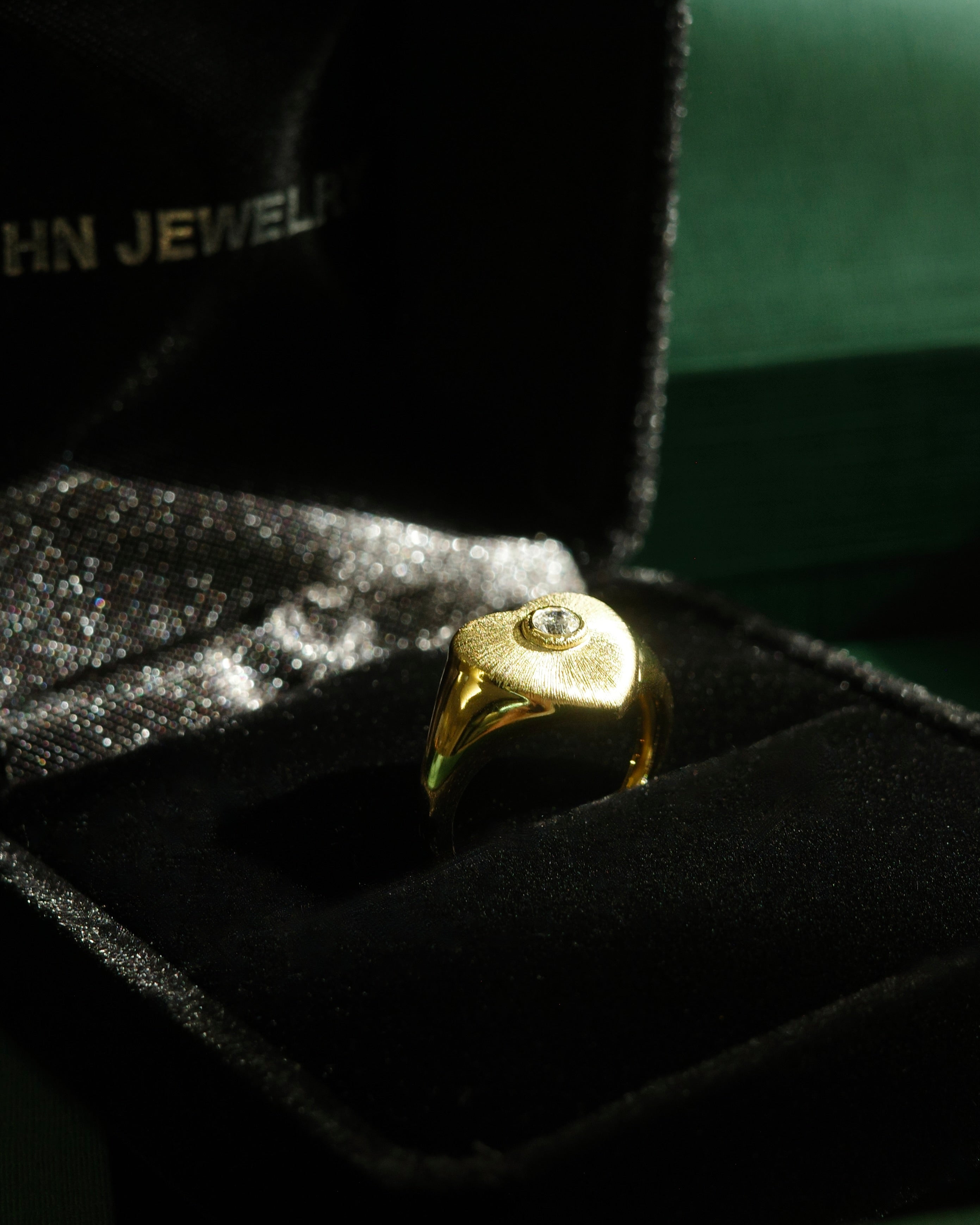 Unique heart signet ring with round diamond