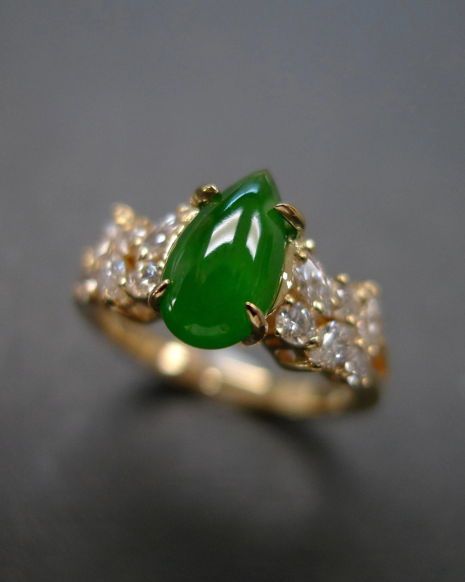 pear shape green jade and marquise diamond ring in 18k gold