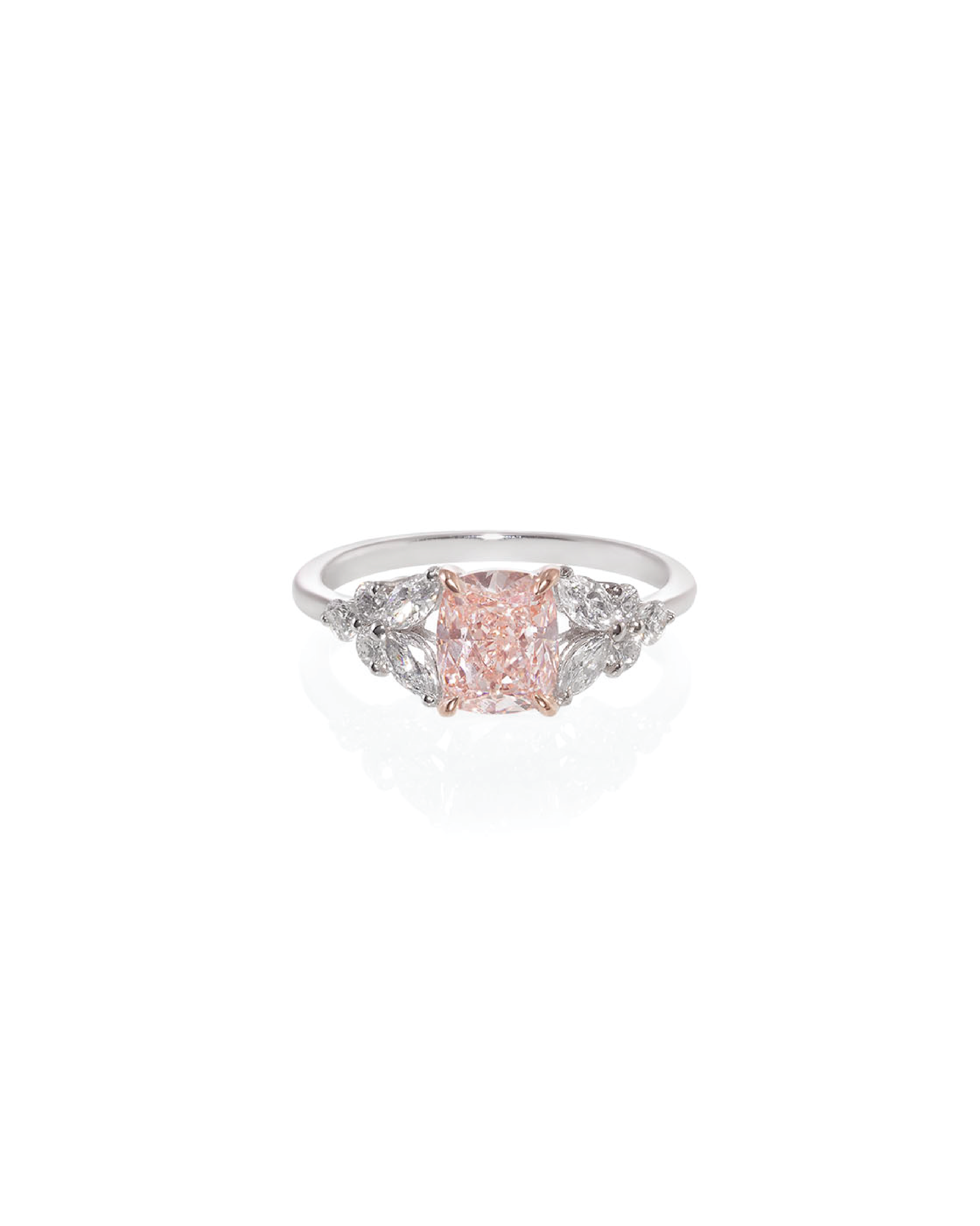 ring with a pink gemstone on a white background