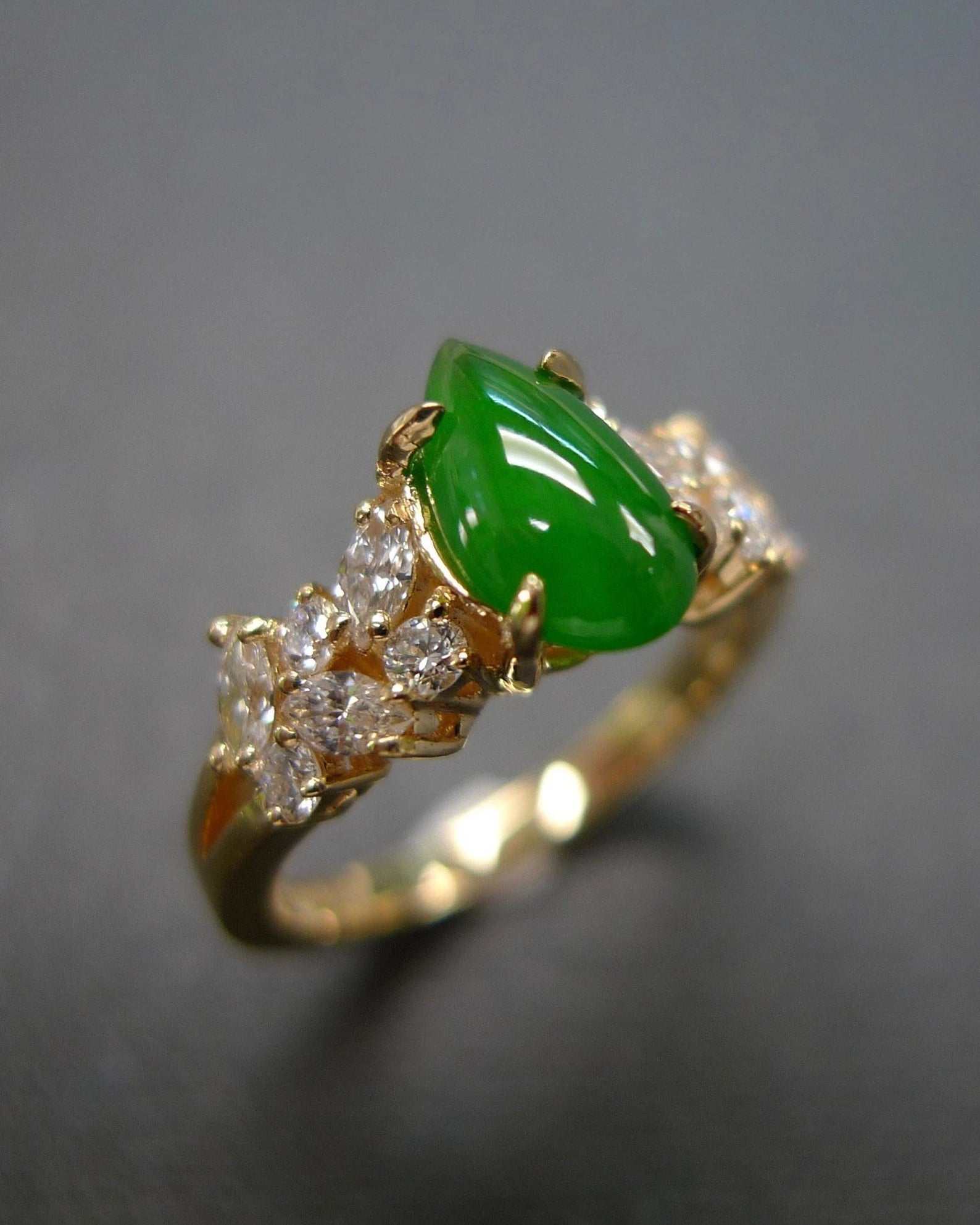 18k gold ring with pear shape jade and marquise diamonds