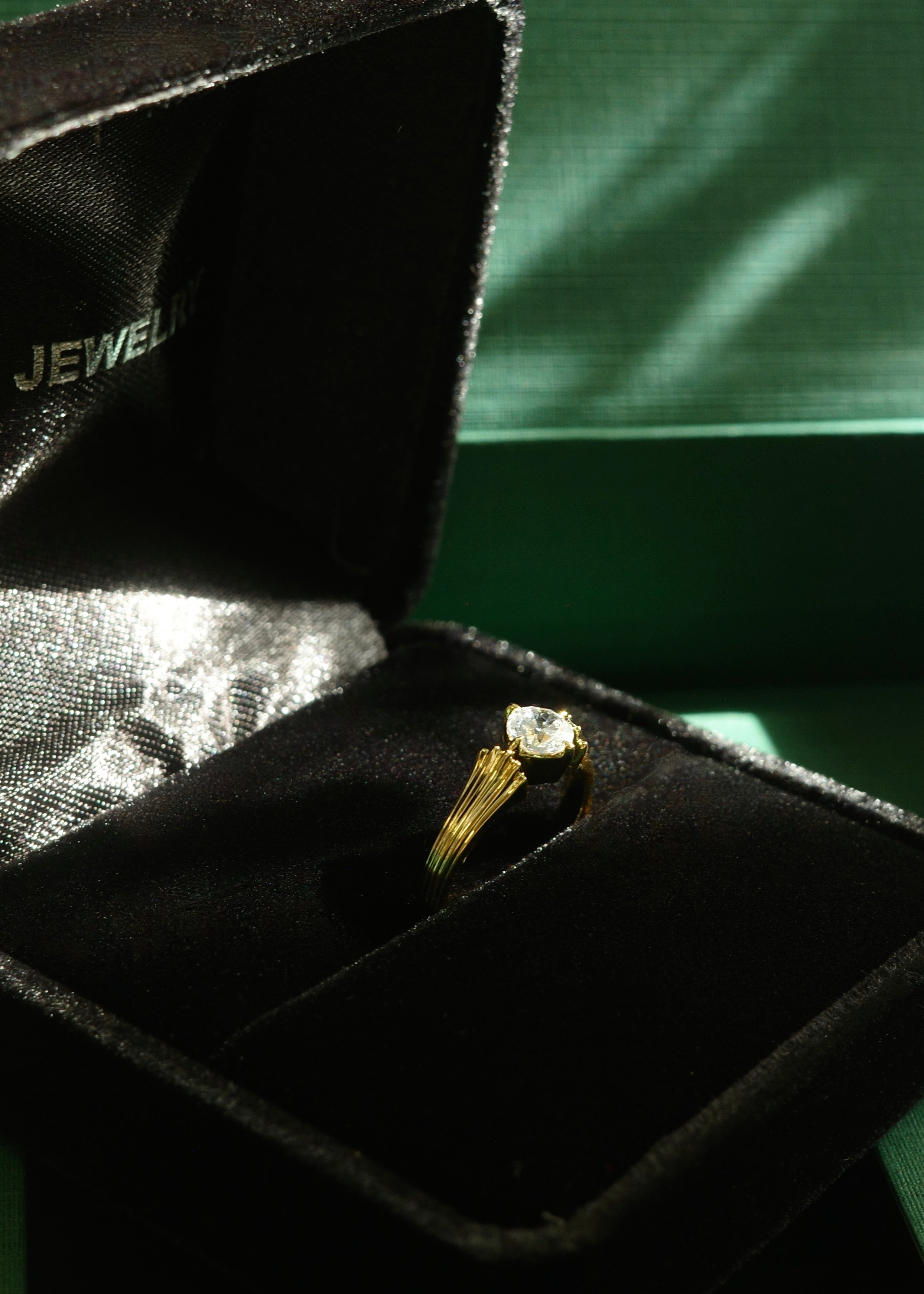 Minimalist solitaire diamond ring with 0.50ct center stone