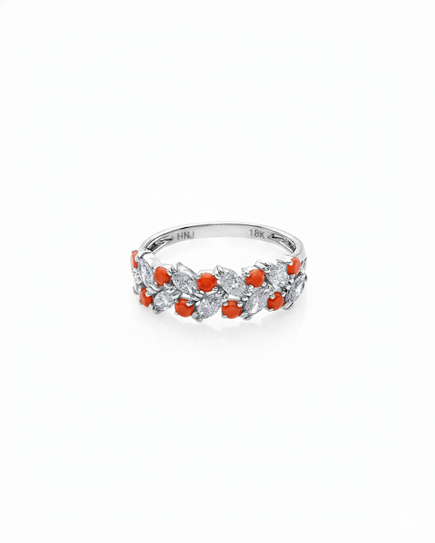 Round coral gemstone ring with marquise diamonds