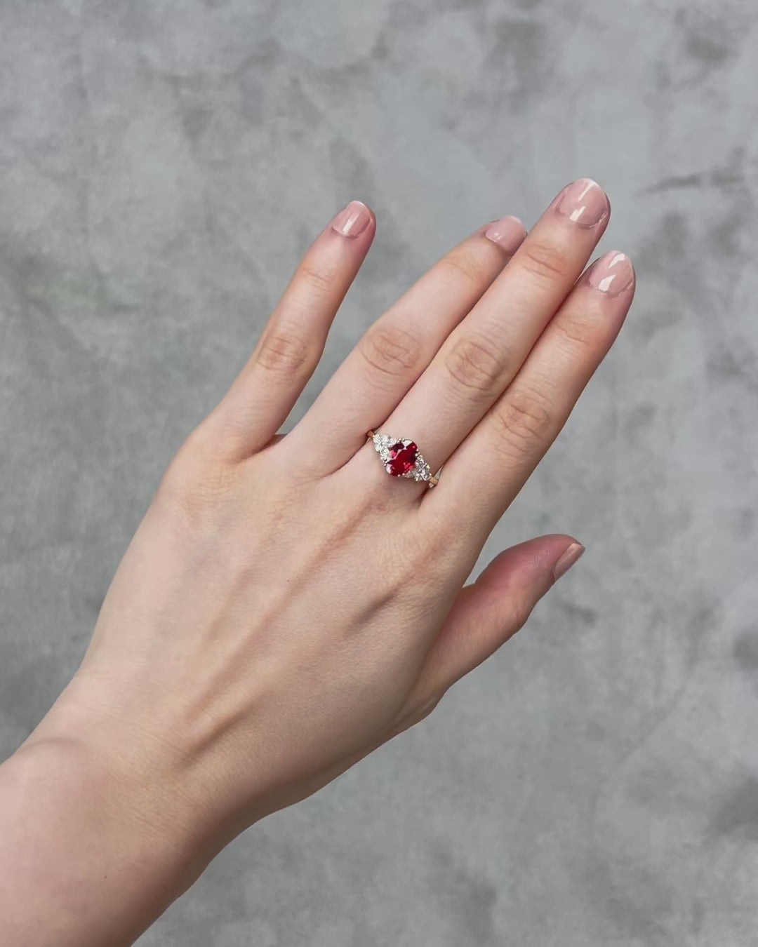 modern gold ring with orange sapphire and marquise diamonds