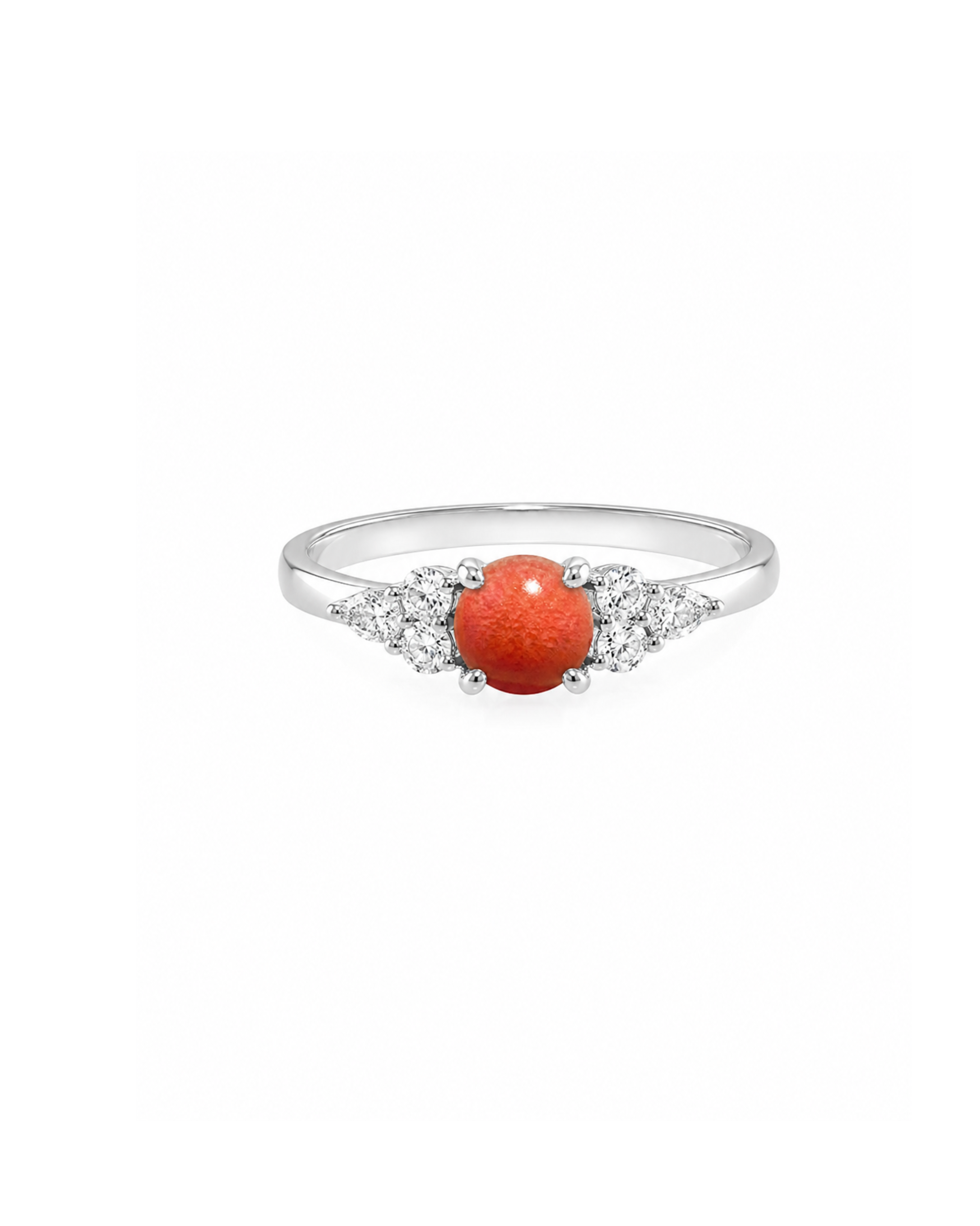 A white gold ring featuring a round red conch pearl at the center, flanked by pear diamonds and round diamond in a split-shank design, set against a plain white background.