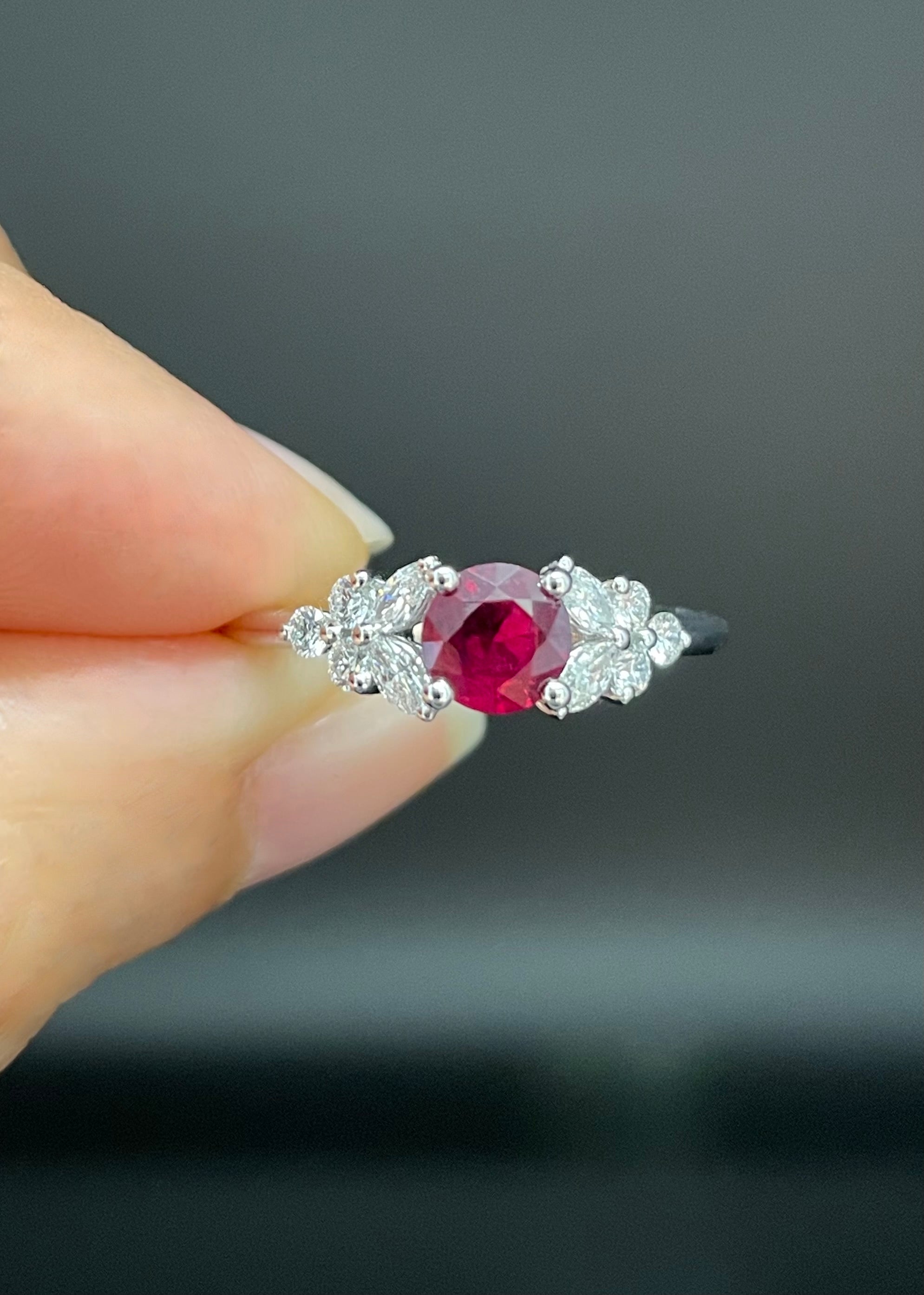 Fine jewelry ruby ring in white gold with diamond side stones