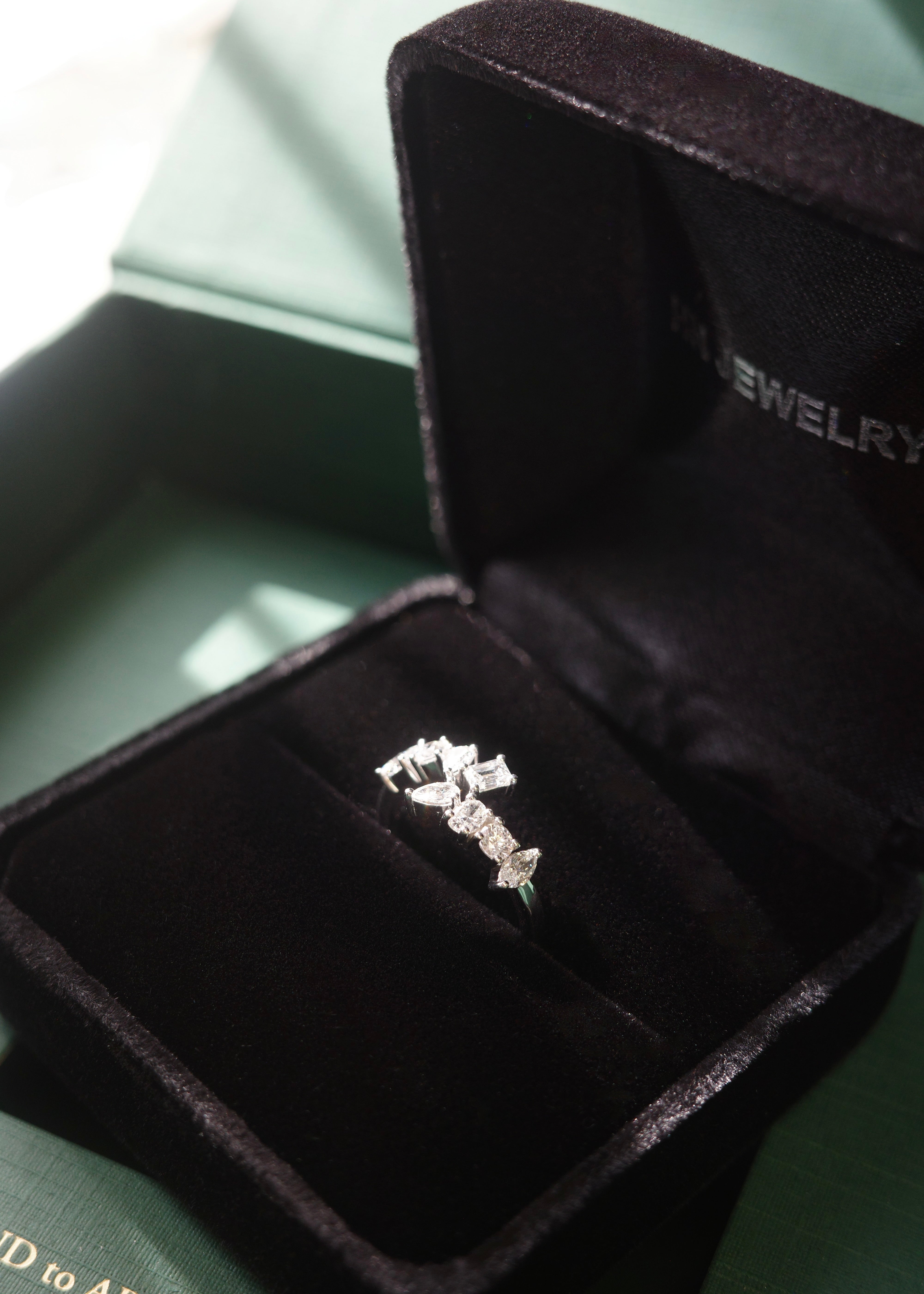 HN Jewelry packaging with mixed cut diamond ring in 14k white gold