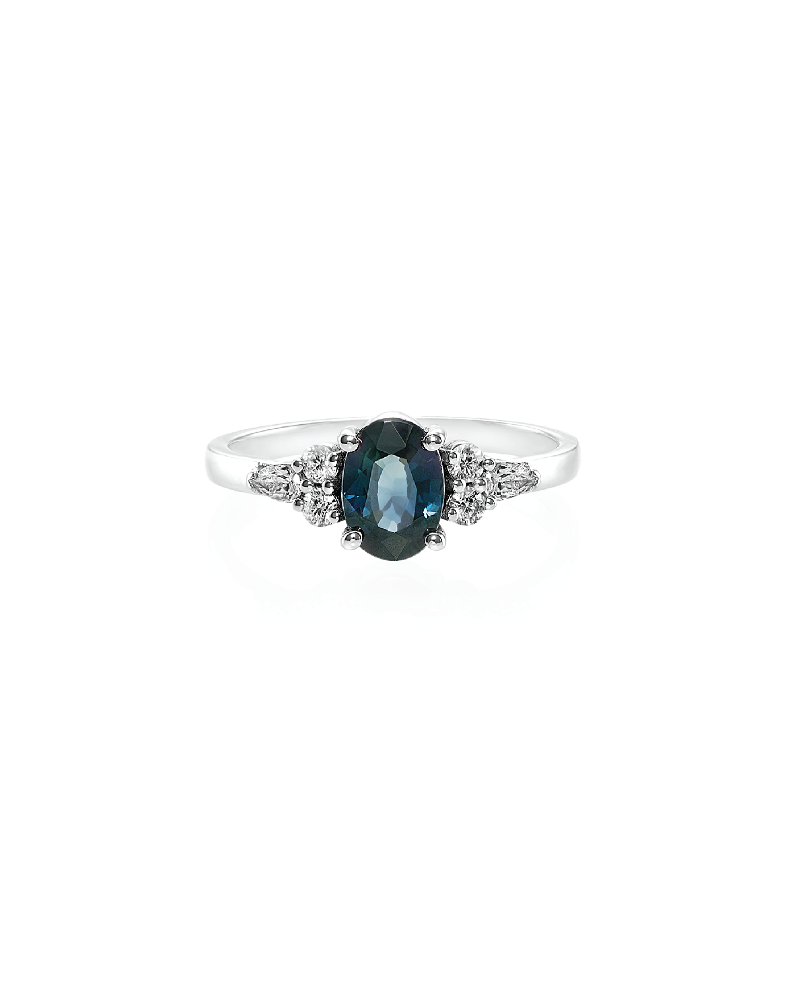 An elegant teal sapphire and diamond ring with round and pear cut diamonds flanking an oval teal sapphire on a white gold band.