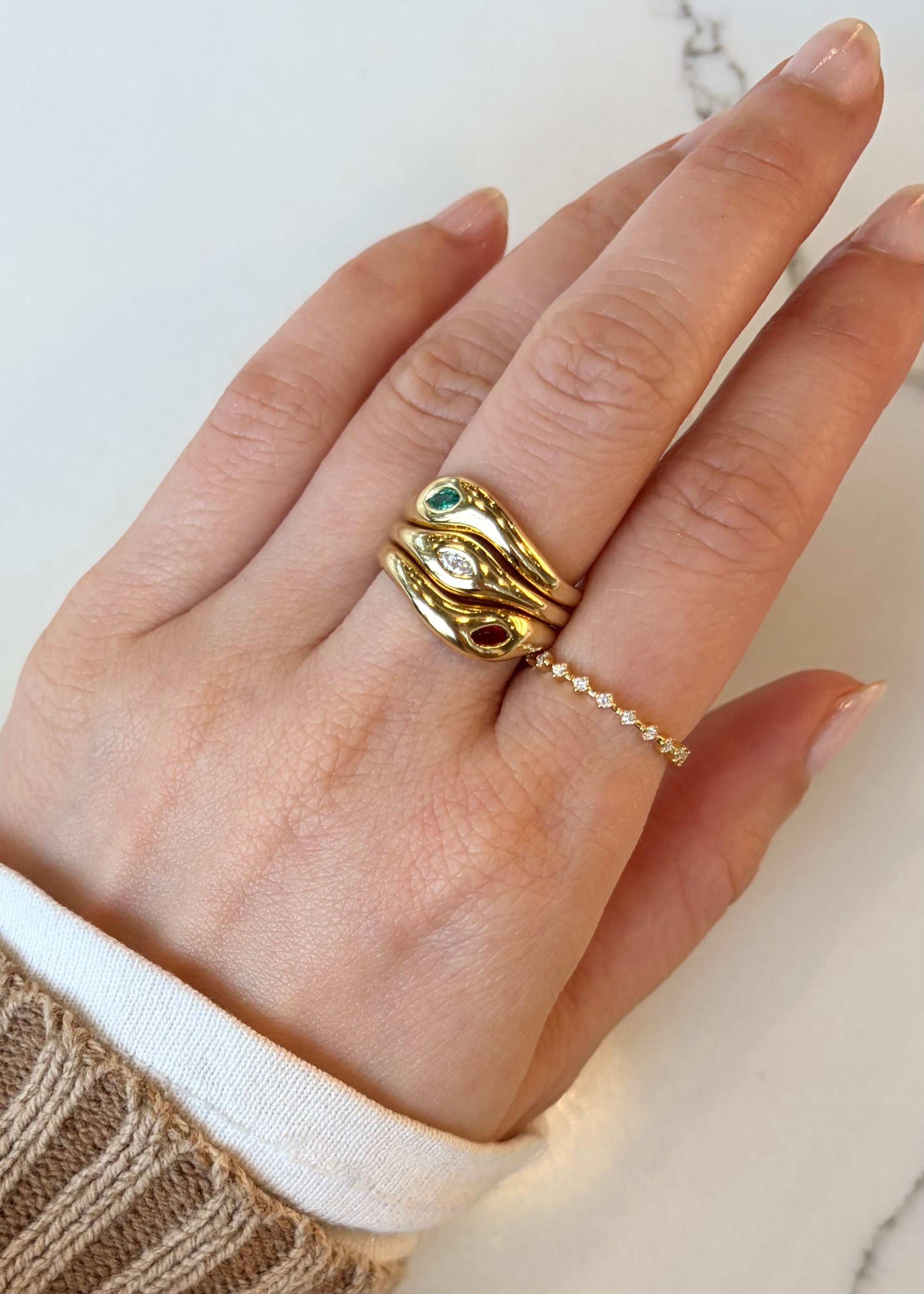 Stackable Dôme ring set with emerald, diamond, and ruby accents