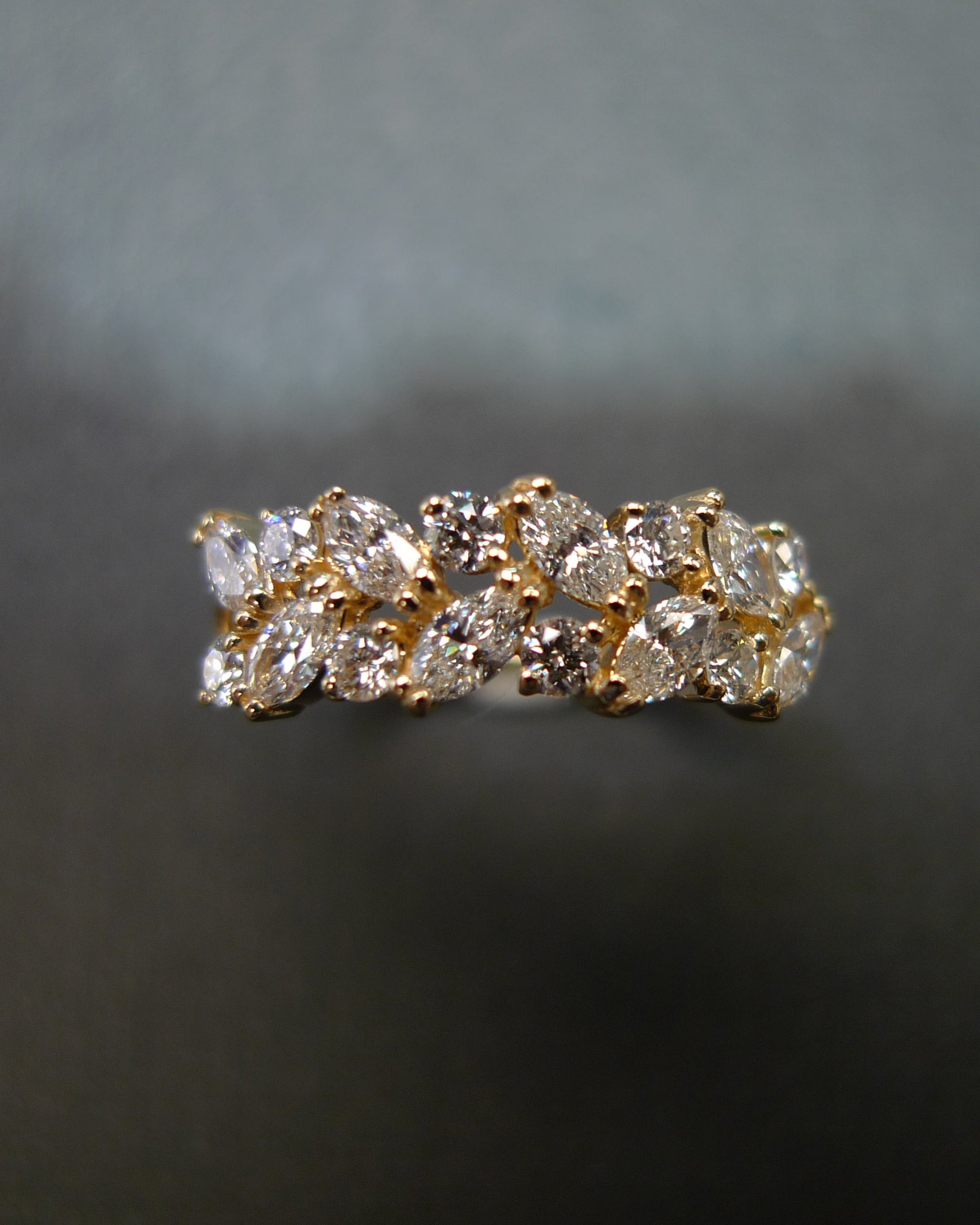 Minimalist marquise diamond ring in warm yellow gold