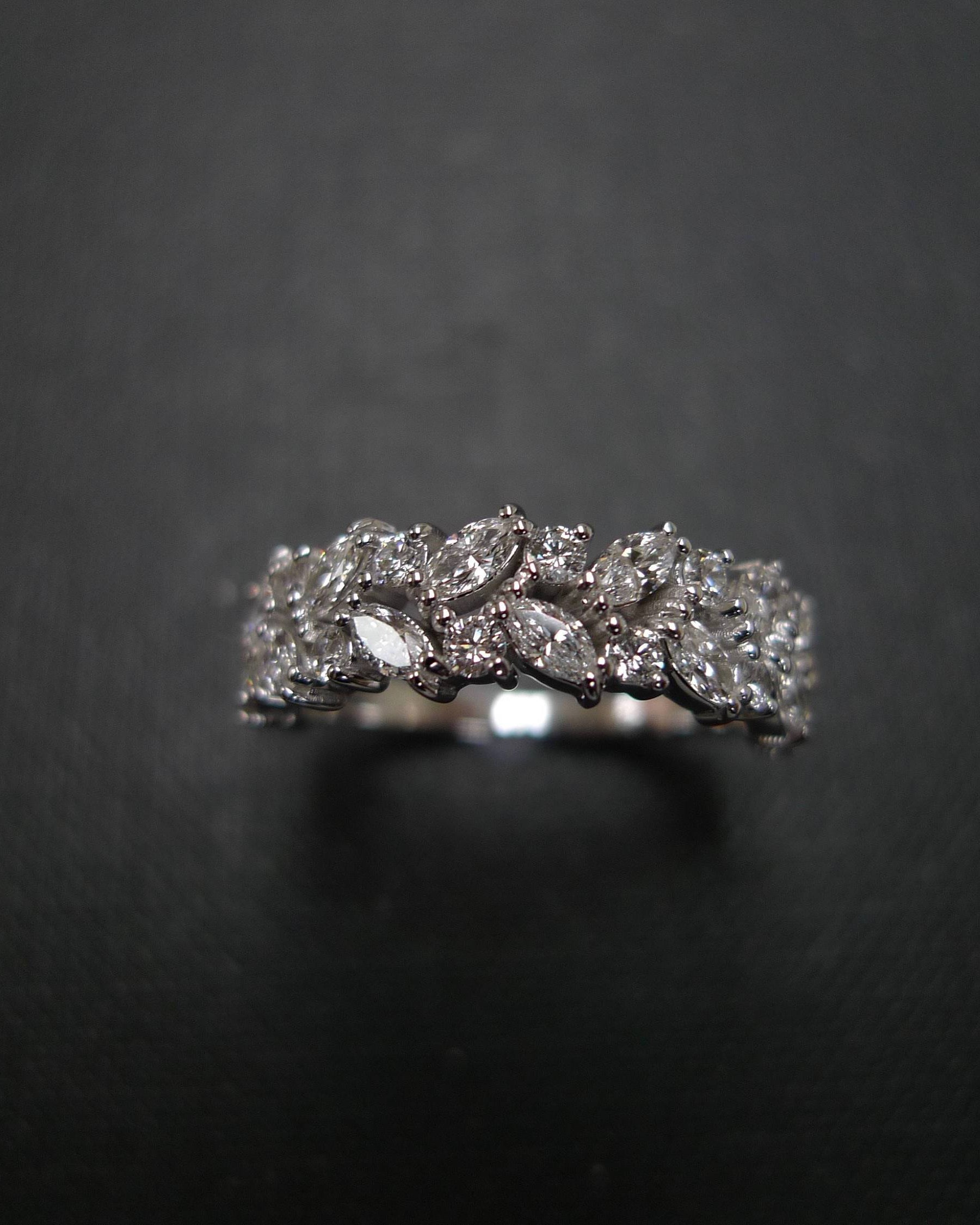 close up marquise diamond wedding band half eternity design