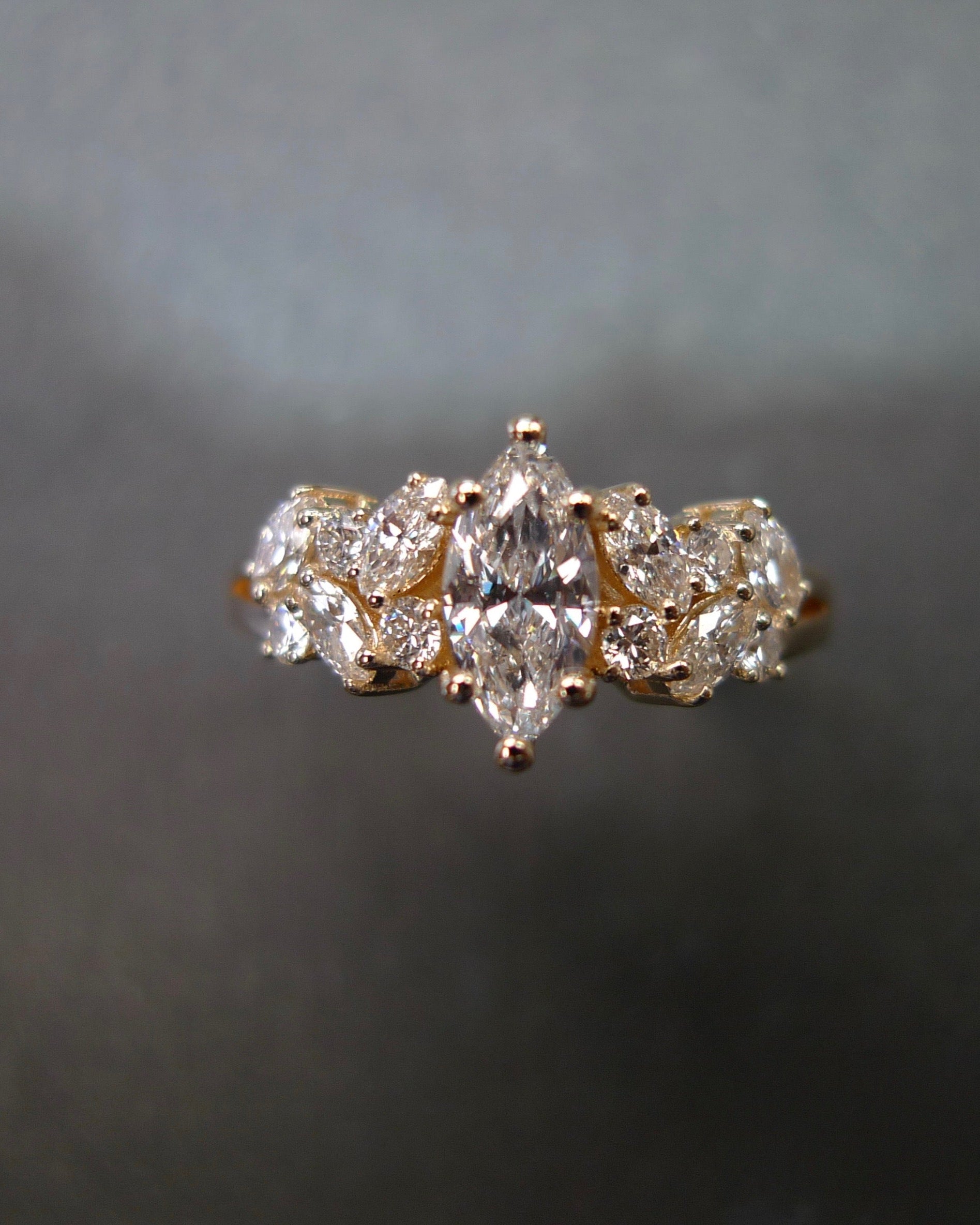 timeless engagement ring featuring marquise cut diamonds