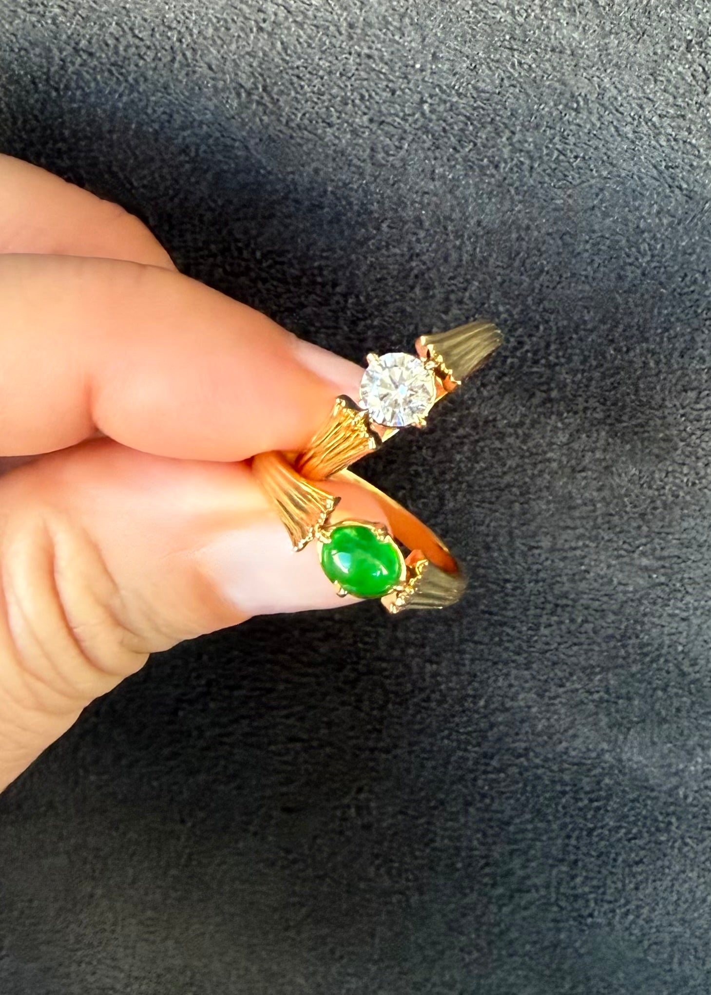 Oval green jade ring set in 14k yellow gold