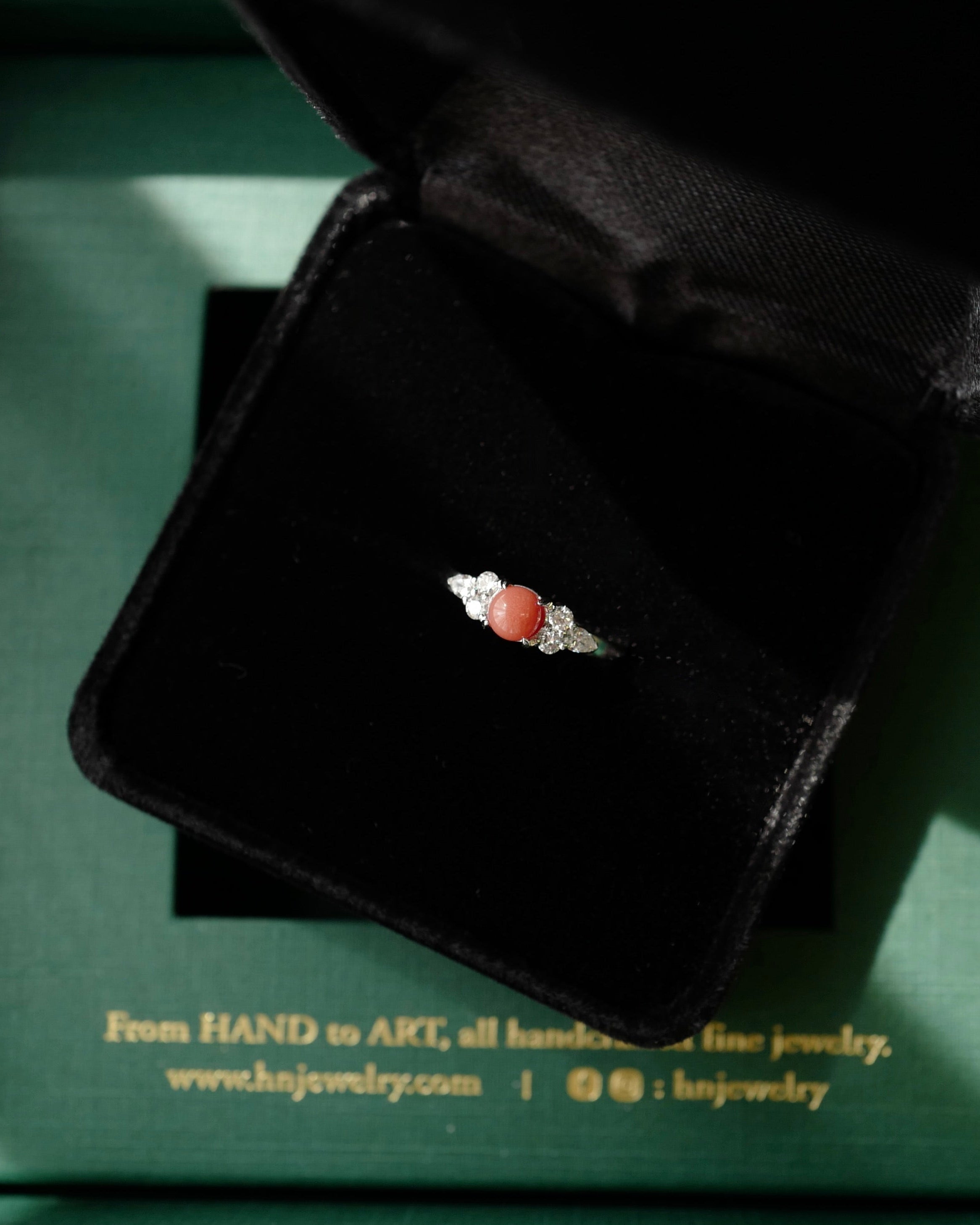 HN Jewelry Branded presentation box holding the unique 1-of-1 intense flame red conch pearl diamond ring.
