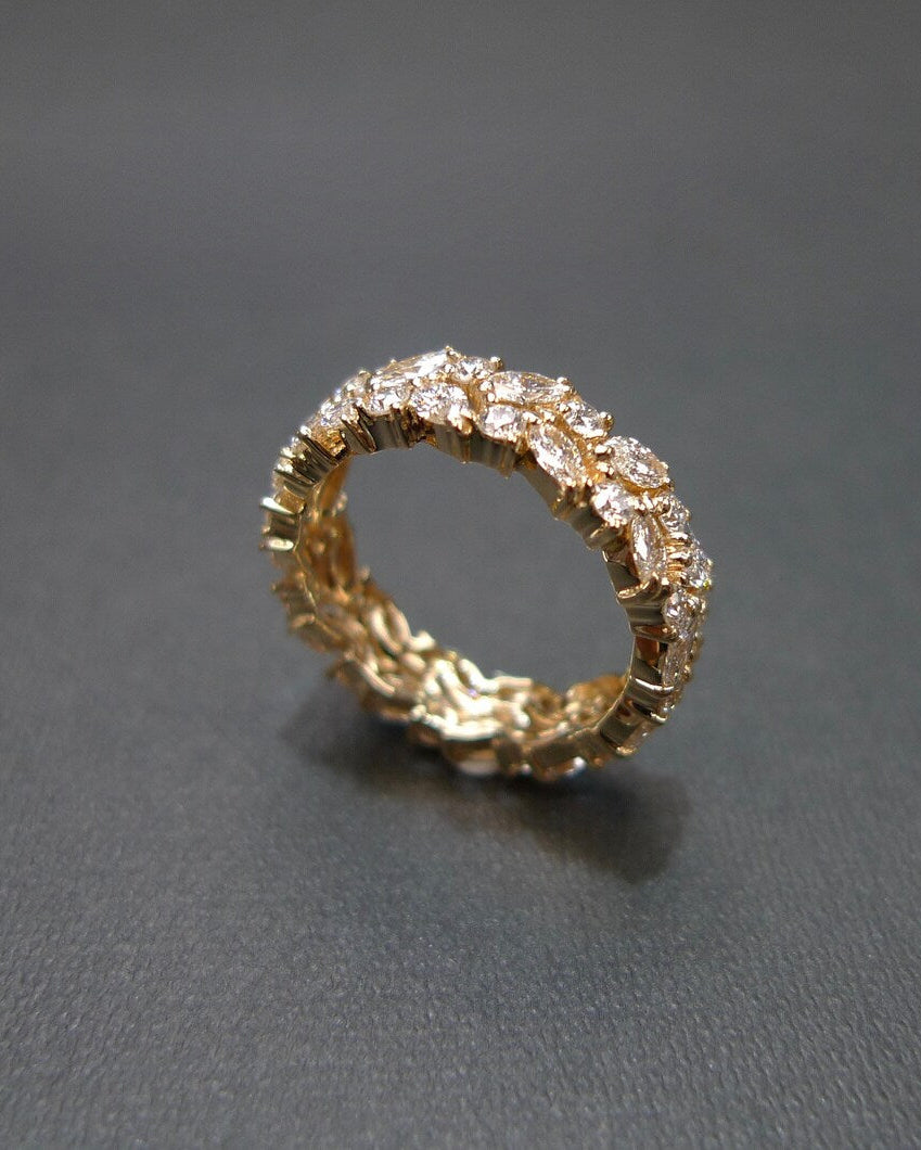 timeless eternity ring featuring marquise cut diamonds