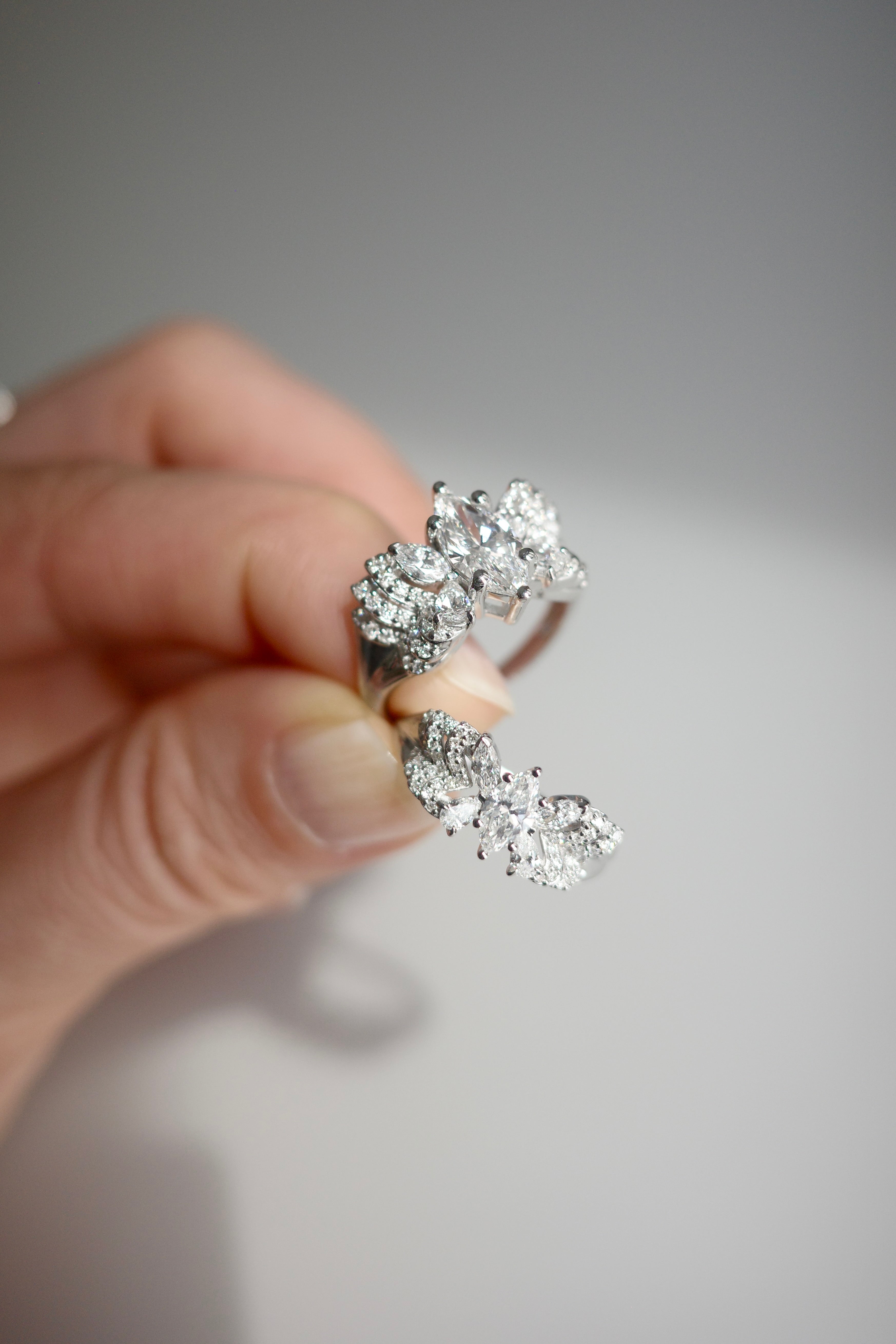 Butterfly-inspired white gold ring with 1ct marquise diamond and diamond accents