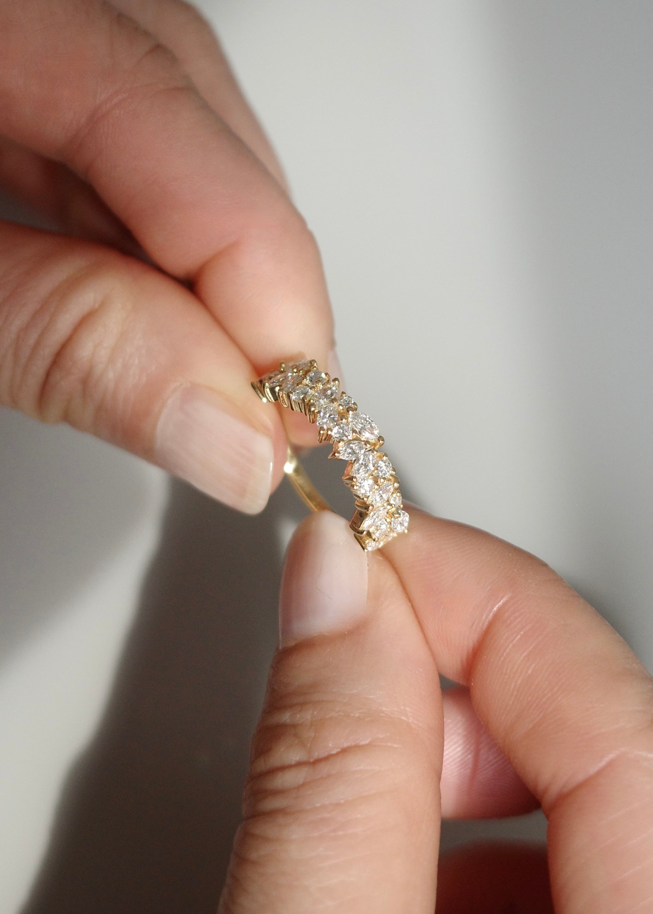 Luxury diamond band ring with marquise and round cut diamonds
