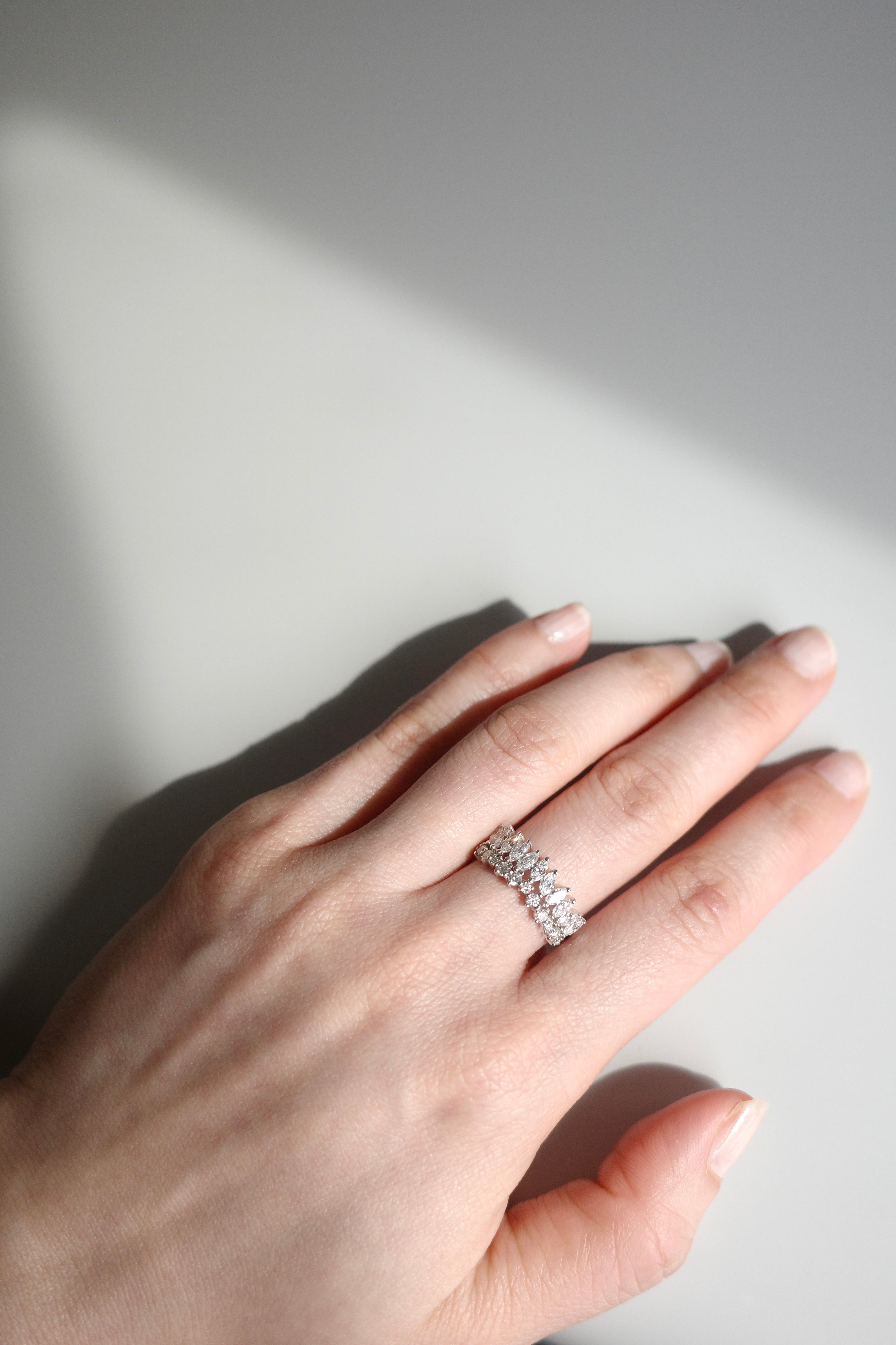 Marquise and round diamond tiara ring in white gold front view