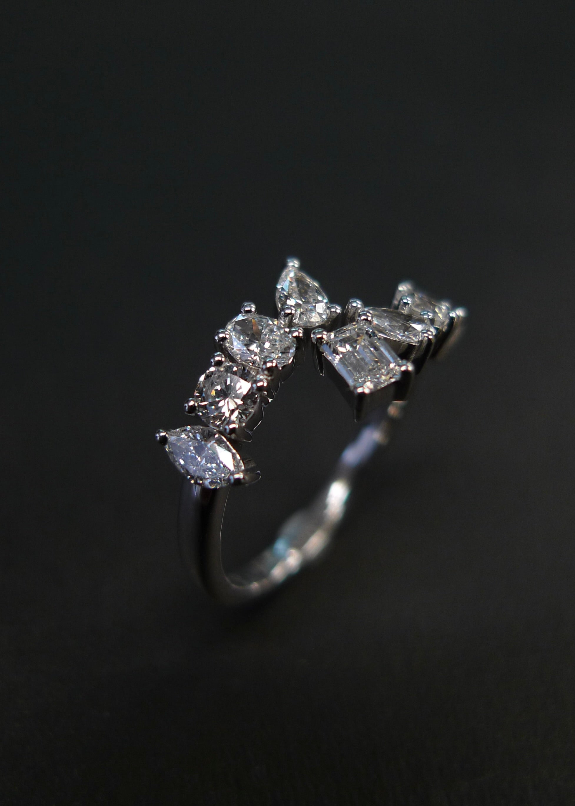 Modern diamond ring in white gold with multi shape diamonds