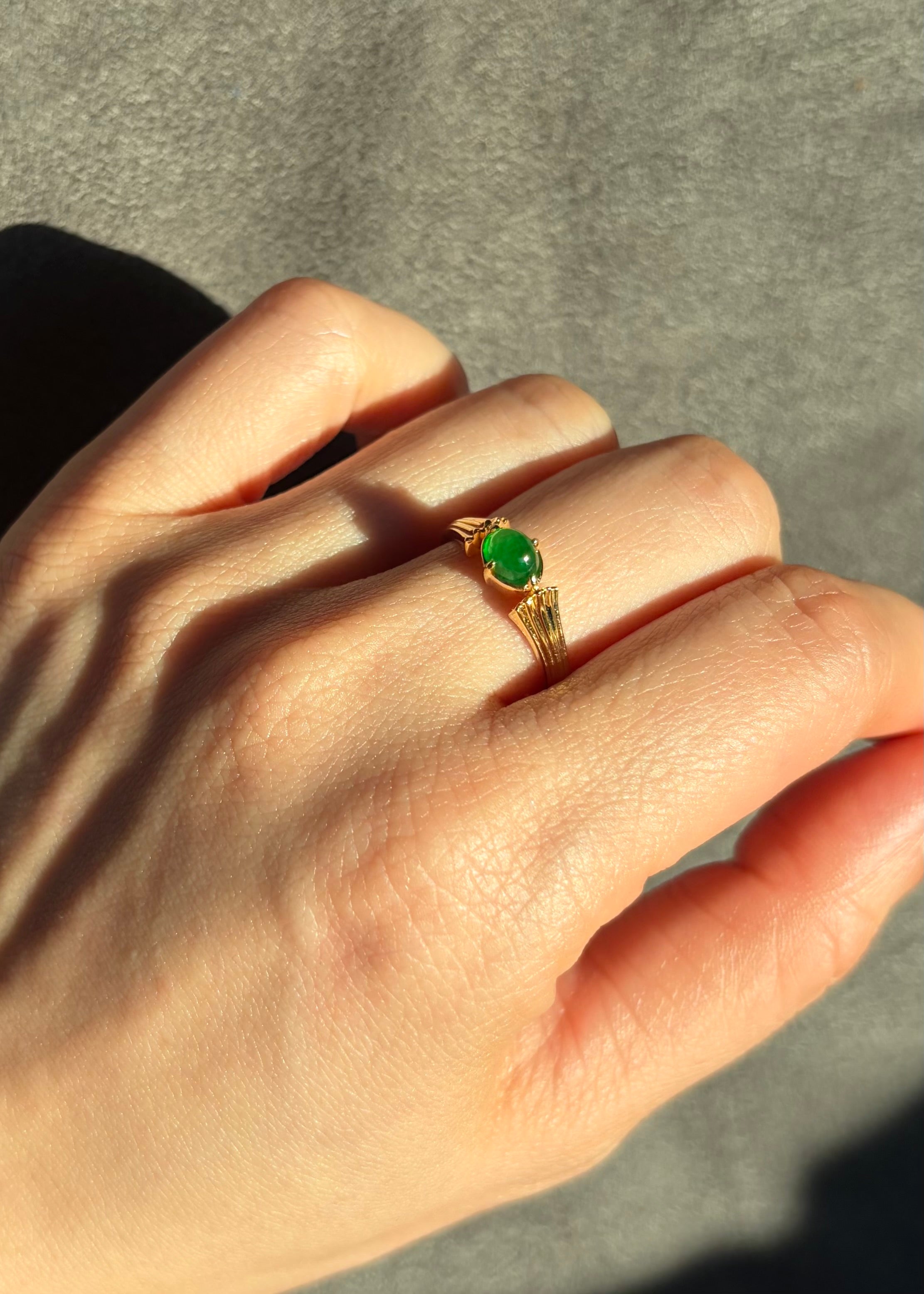 Natural green jade cabochon ring in 14k yellow gold