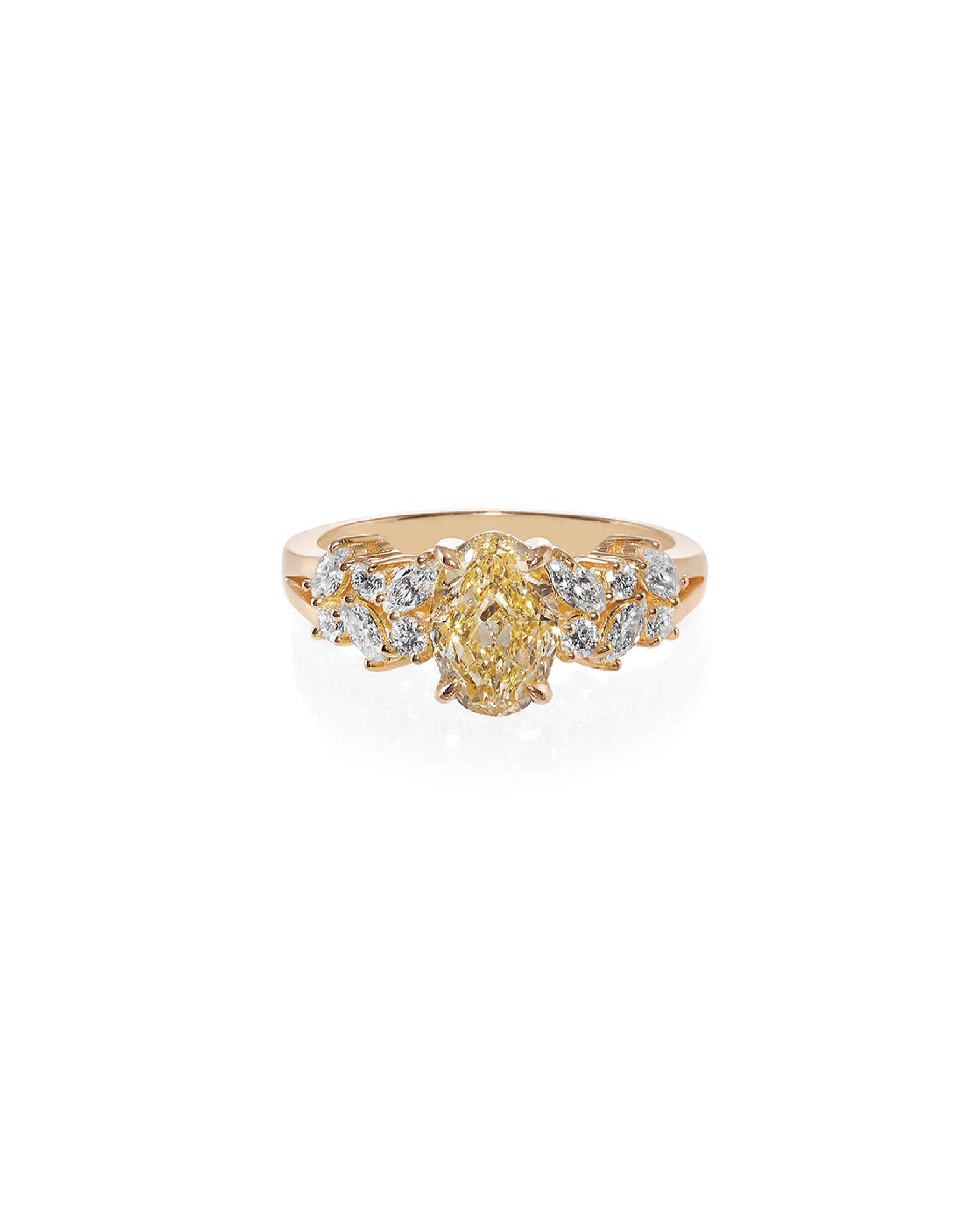 A 14K yellow gold ring with a fancy yellow oval diamond center, surrounded by round and marquise diamond patterns.