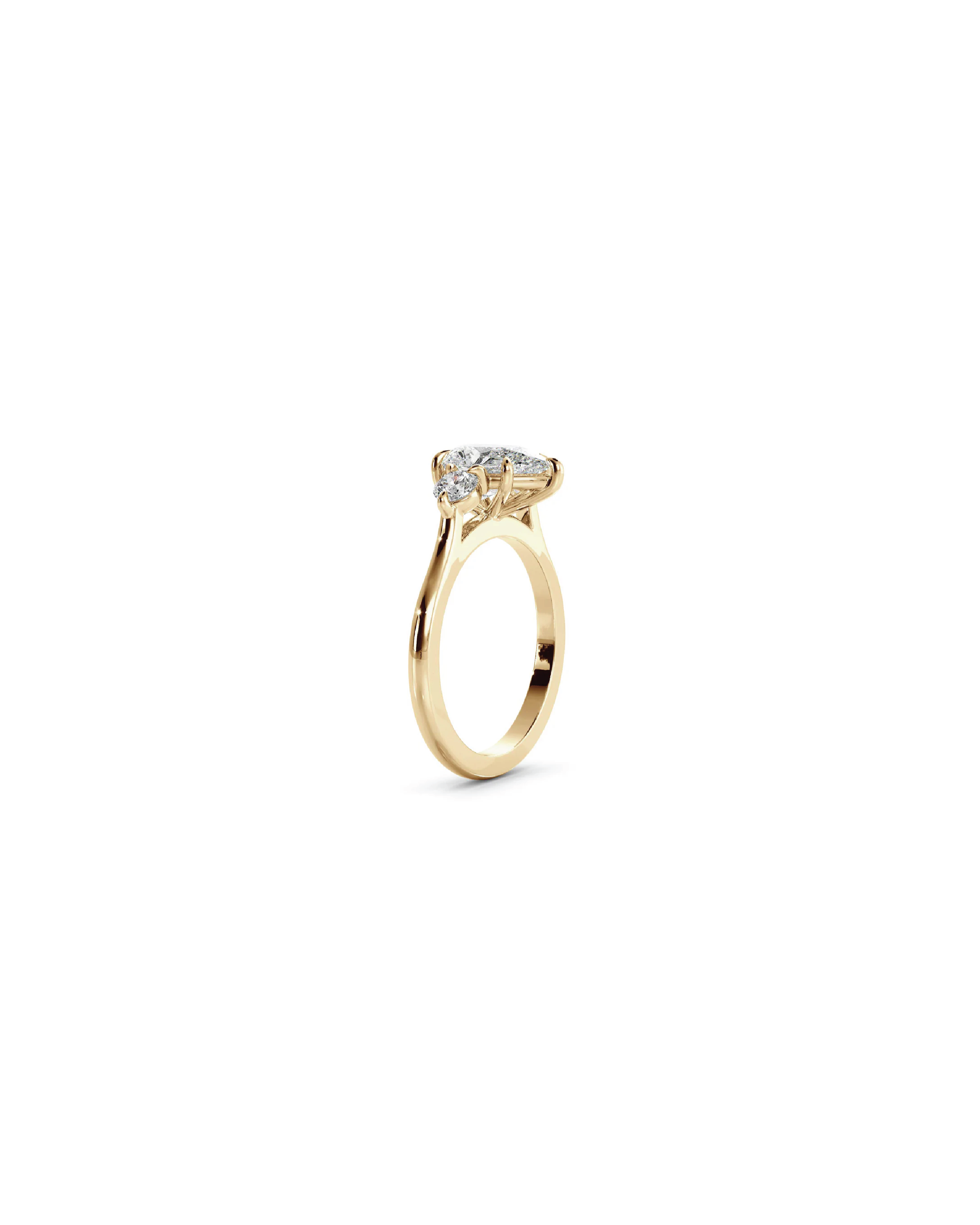 Pear & Round Three-Stone Ring