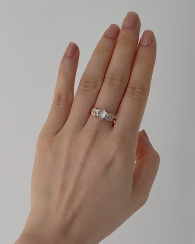 Cultural significance jade engagement ring with marquise diamonds