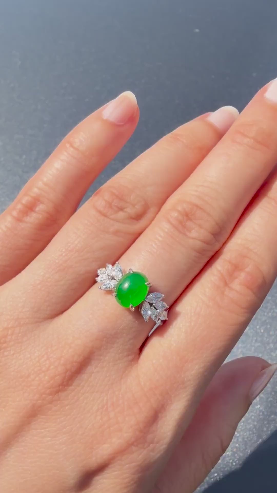 Imperial green oval jadeite cabochon ring with marquise diamond side clusters in solid white gold, HN JEWELRY