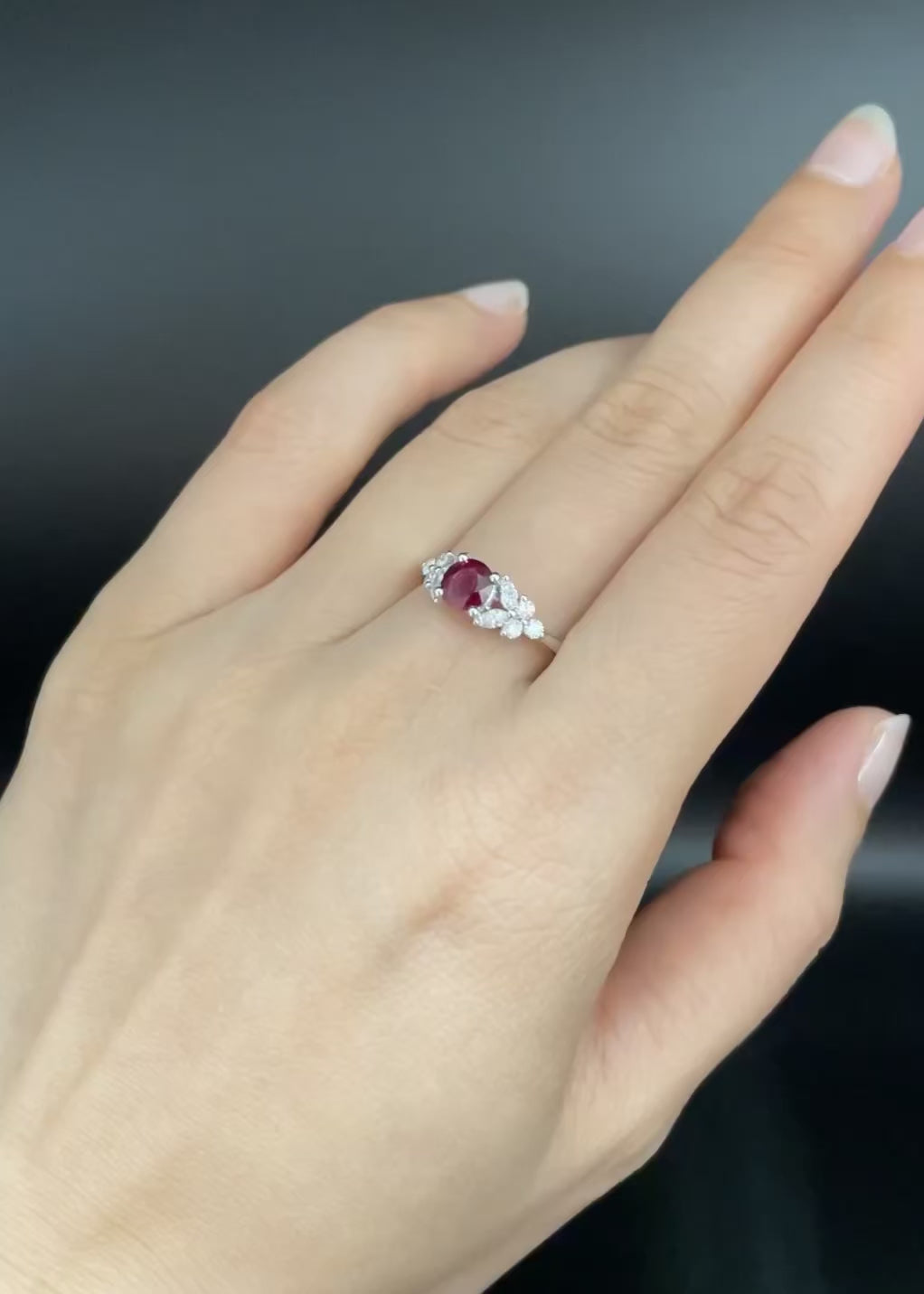 Luxury ruby and diamond ring with marquise and round brilliant cut diamonds