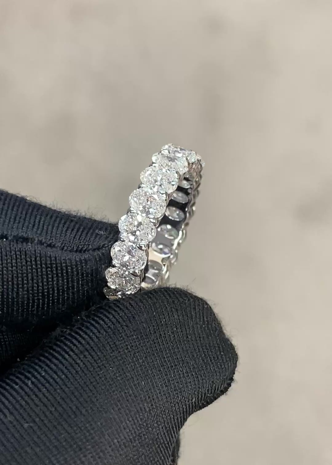 Classic oval diamond eternity ring with continuous sparkle