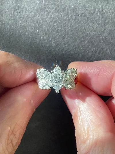Custom butterfly engagement ring with marquise diamond