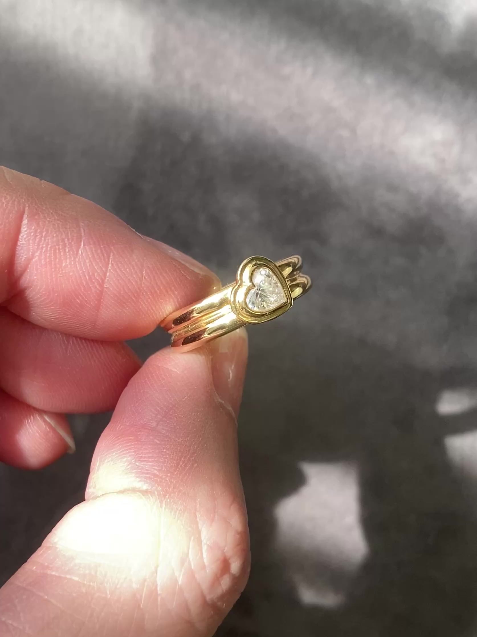 contemporary signet ring with heart diamond