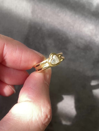 contemporary signet ring with heart diamond