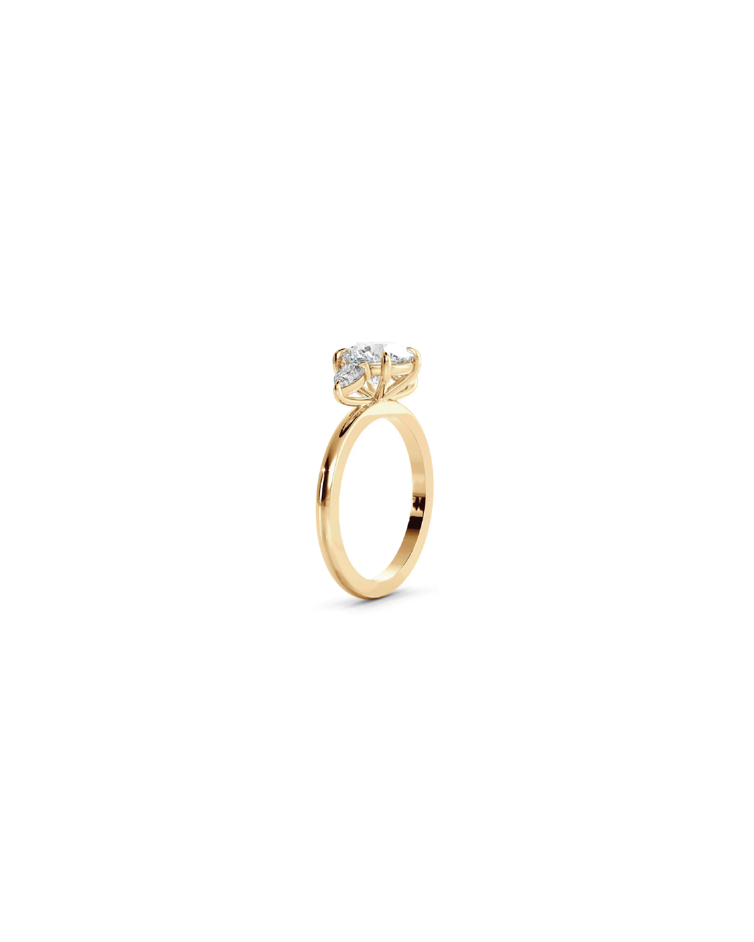 Round and Pear Three-Stone Ring