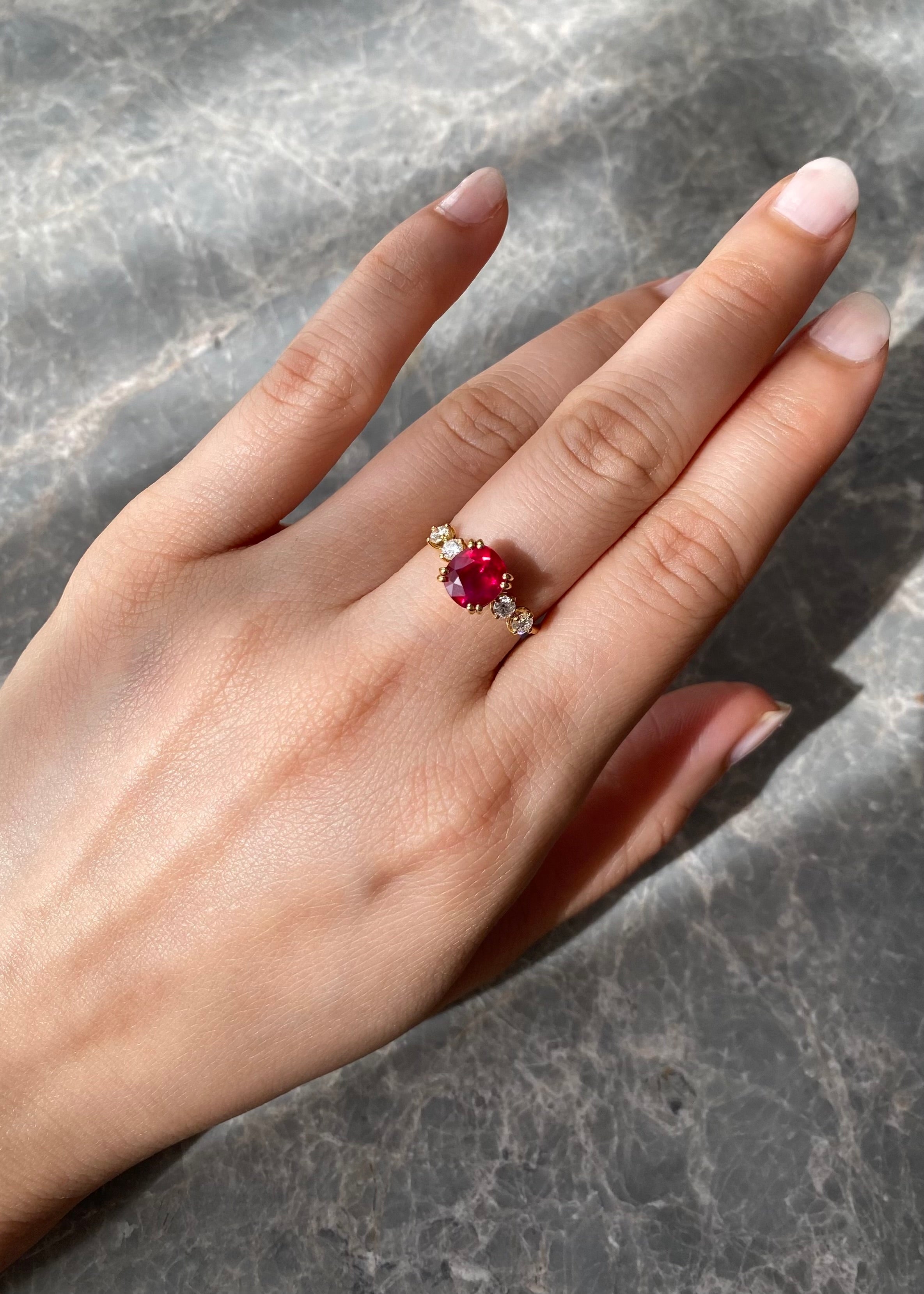 Fine jewelry ruby ring set with sparkling round diamonds