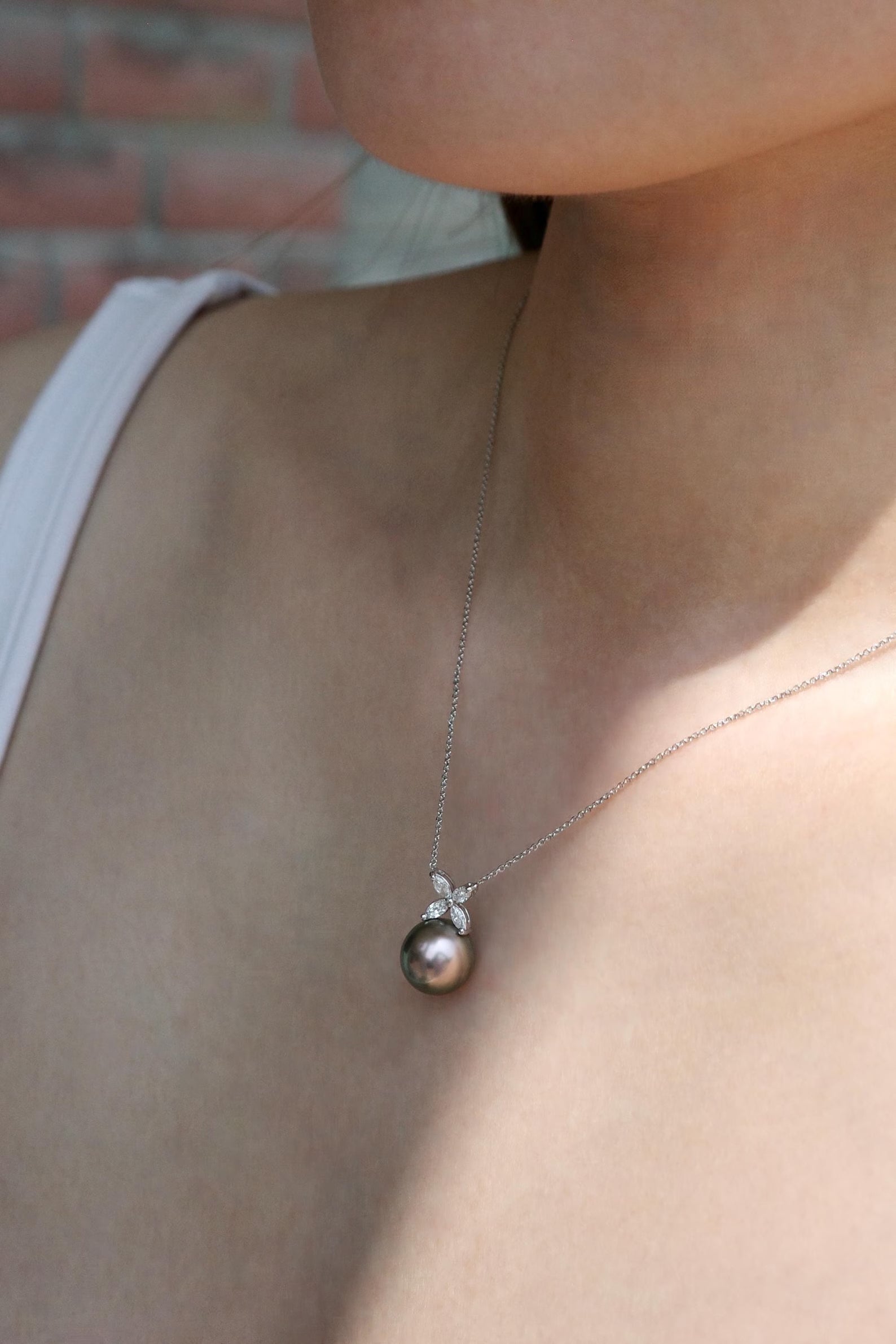 South Sea Black Pearl necklace set with marquise diamonds