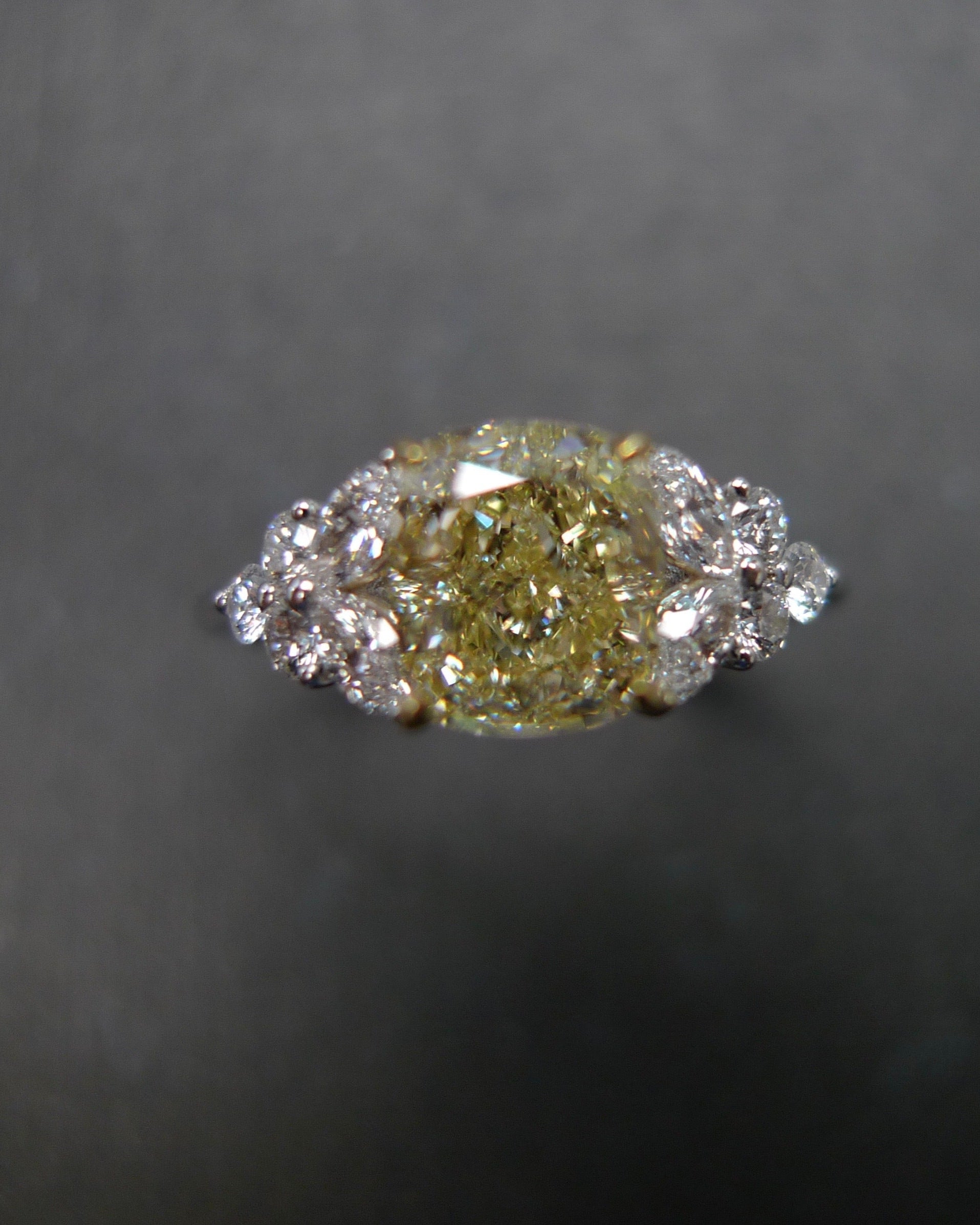Luxury cushion cut yellow diamond ring with marquise cut side diamonds bridal jewelry