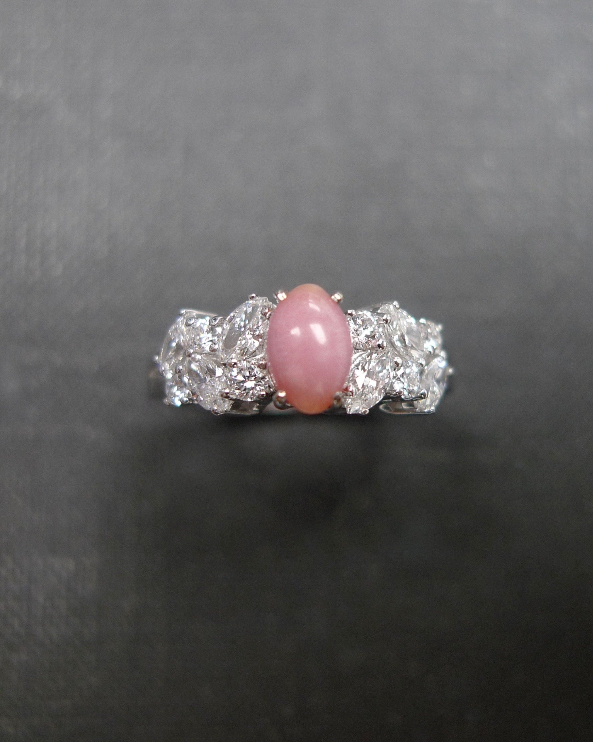 timeless engagement ring with conch pearl center stone