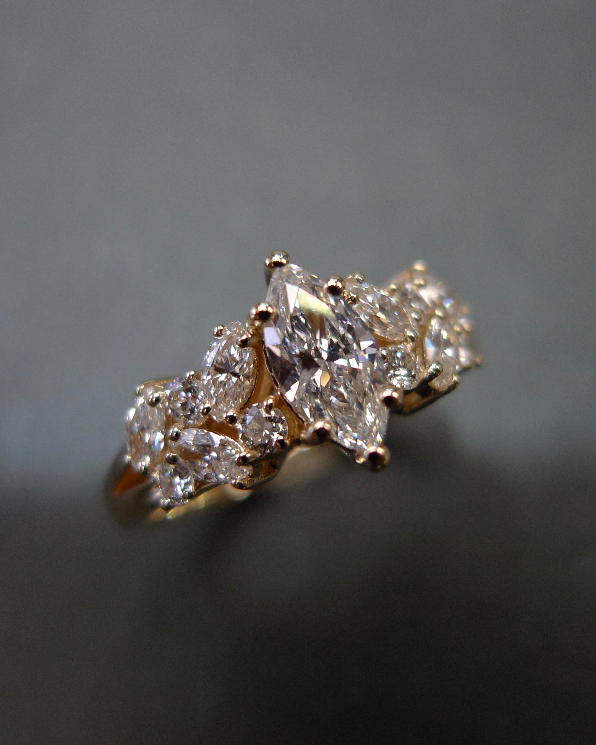 modern marquise diamond solitaire ring in gold setting