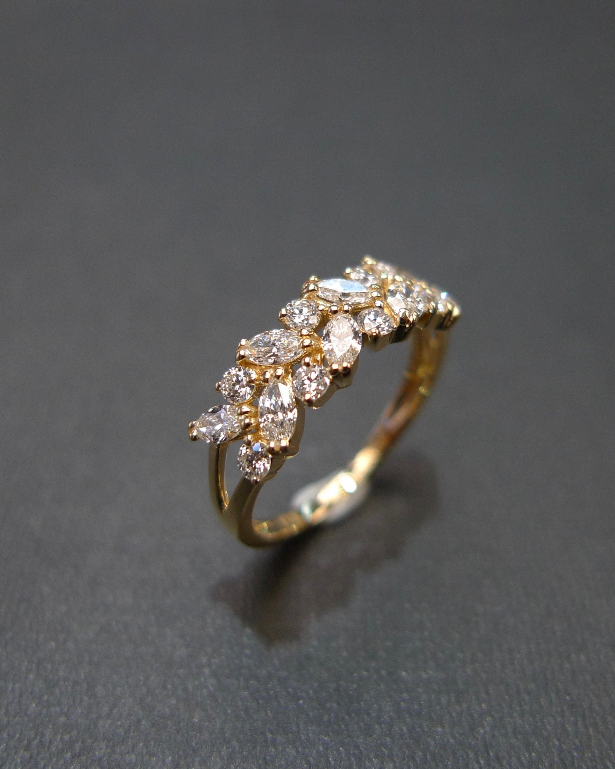 Unique wedding ring set with marquise cut and round brilliant cut diamonds 